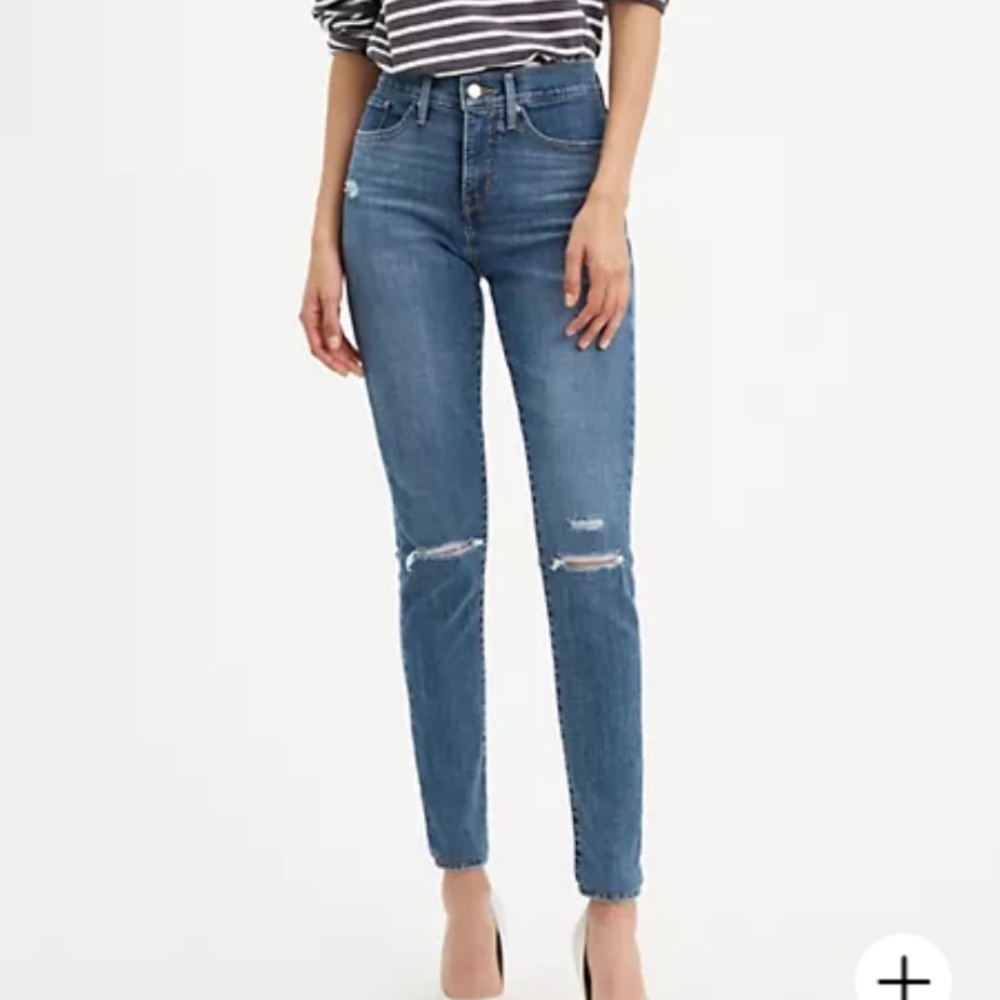 Levi’s 311 shaping skinny jeans in a medium wash